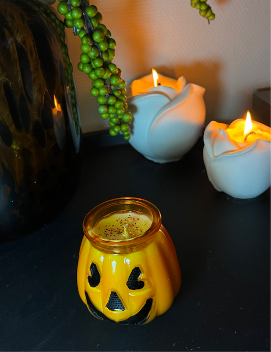 Pumpkin light candle